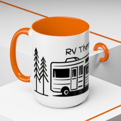 White mug with orange inside and handle